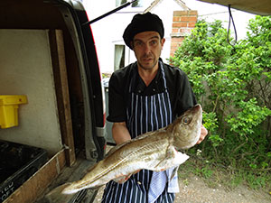 Scott with big fish catch for customers